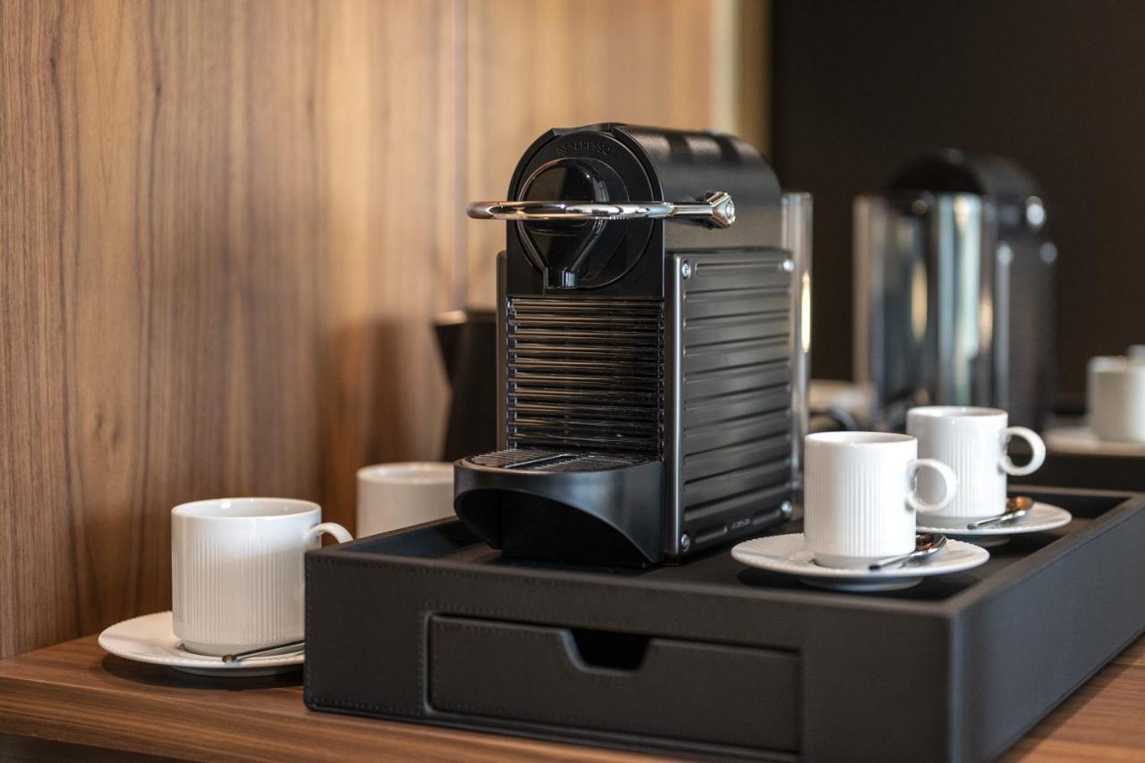 Renaissance Porto Lapa Hotel Esterno foto A Nespresso coffee machine